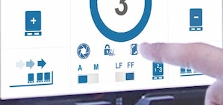 A função de mudança de terminal permite escolher o lado da estante a partir do qual se vai operar
