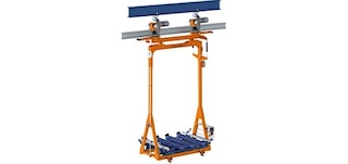 Os carros aéreos circulam num carril fixado no teto do armazém